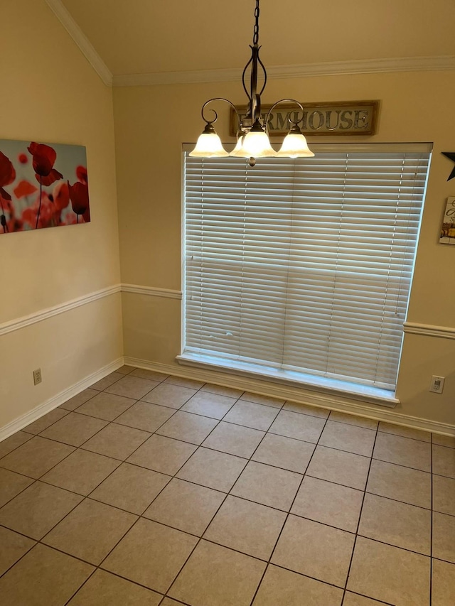 unfurnished dining area featuring crown molding, a chandelier, and light tile patterned flooring