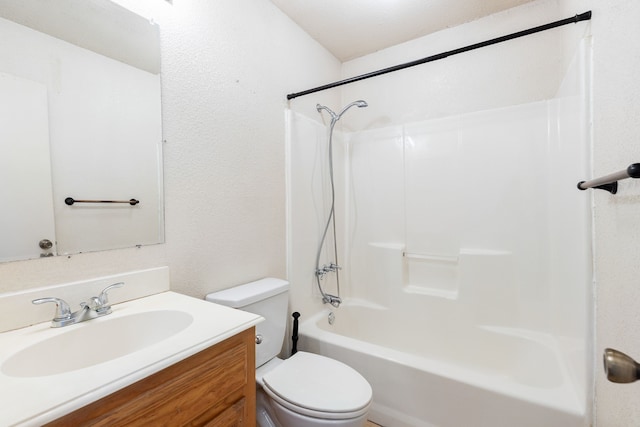 full bathroom with vanity, toilet, and shower / washtub combination