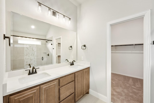 bathroom featuring vanity and walk in shower