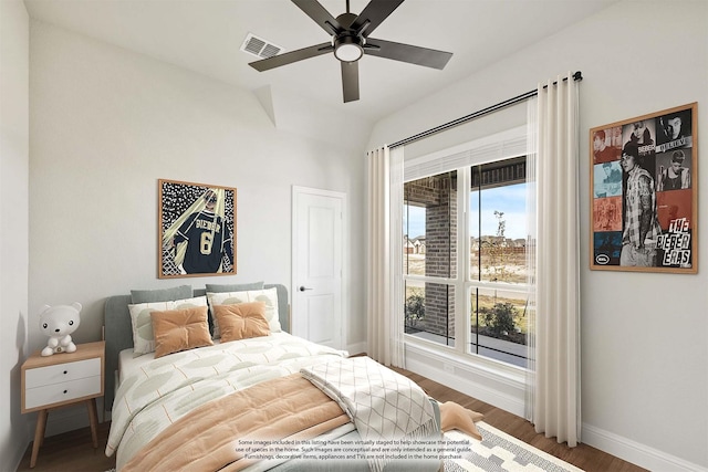 bedroom with ceiling fan and wood-type flooring