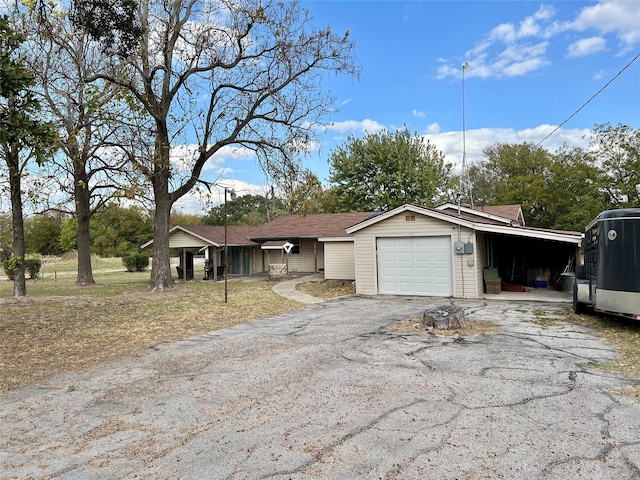 ranch-style home with a garage