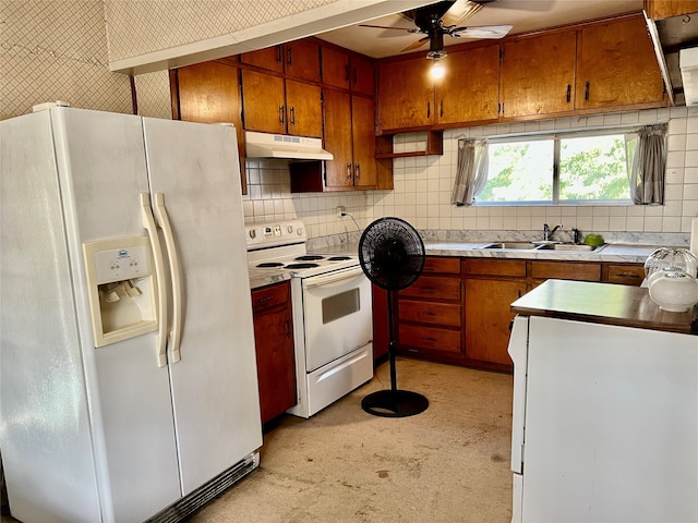 kitchen featuring backsplash, sink, white appliances, and ceiling fan