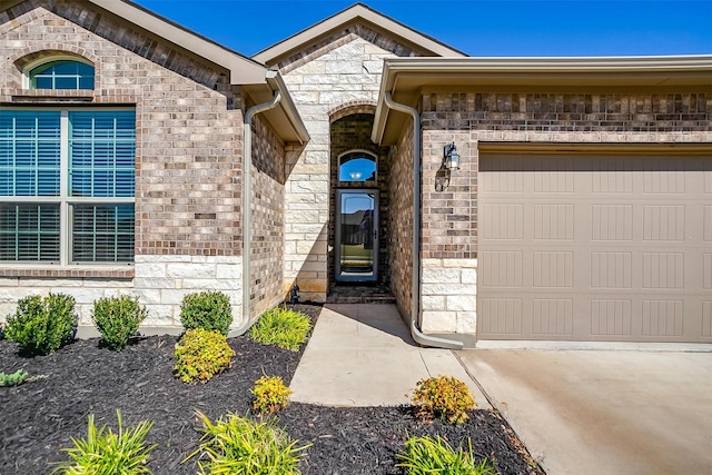 property entrance with a garage