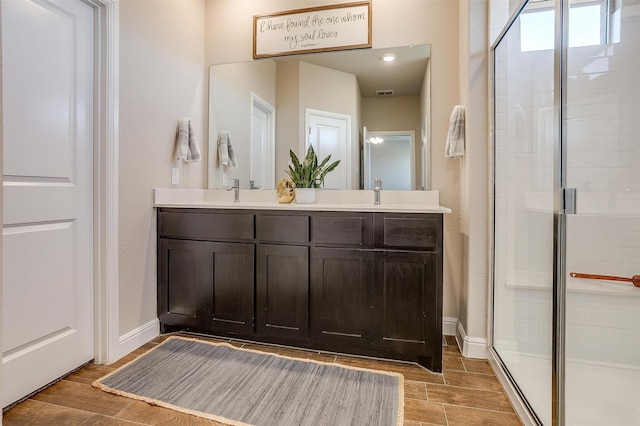 bathroom featuring vanity and walk in shower