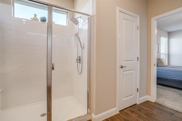 bathroom featuring an enclosed shower