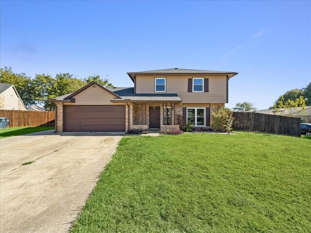 front facade with a garage and a front lawn