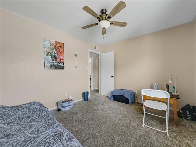 bedroom featuring ceiling fan and carpet floors