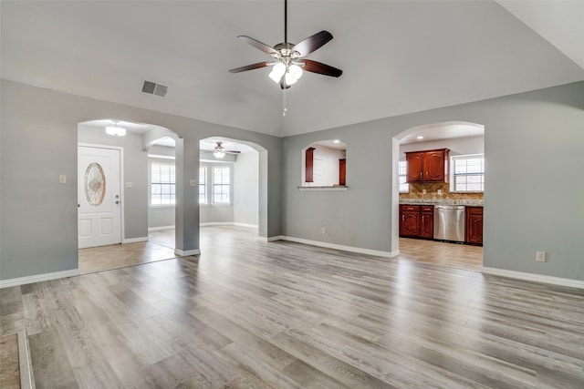 unfurnished living room with ceiling fan and light hardwood / wood-style flooring