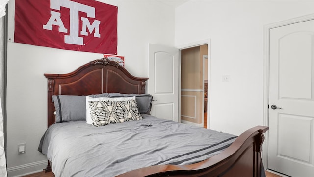 bedroom featuring hardwood / wood-style floors