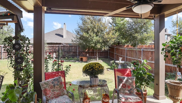 view of yard with ceiling fan