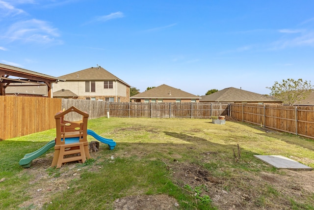 view of yard featuring a playground