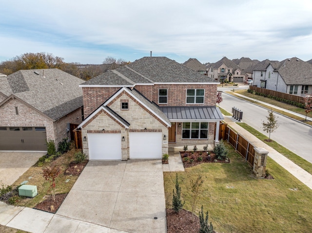 view of front facade with a garage and a front lawn