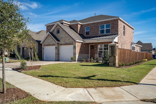 view of front of property with a front lawn and a garage