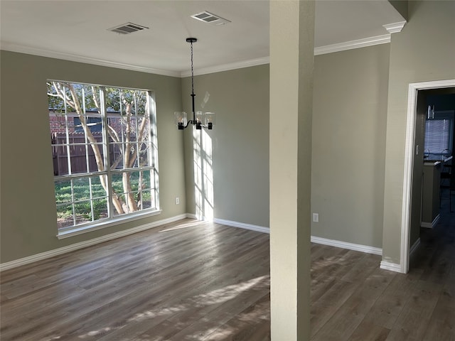 unfurnished dining area featuring dark wood-type flooring and crown molding