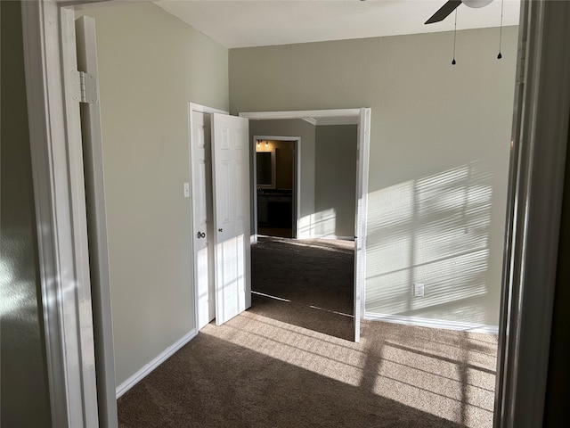 hall featuring carpet