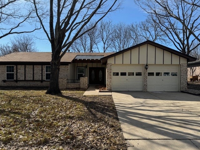 ranch-style home featuring a garage