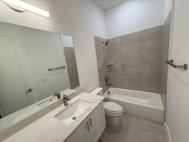 full bathroom featuring vanity, toilet, and tiled shower / bath