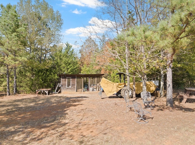 exterior space featuring an outdoor structure