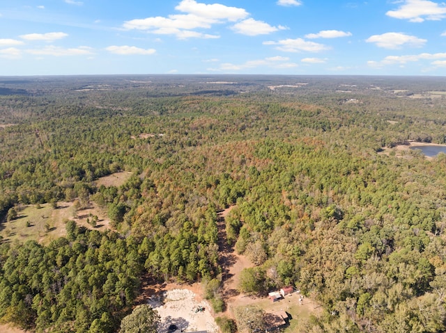 aerial view featuring a view of trees