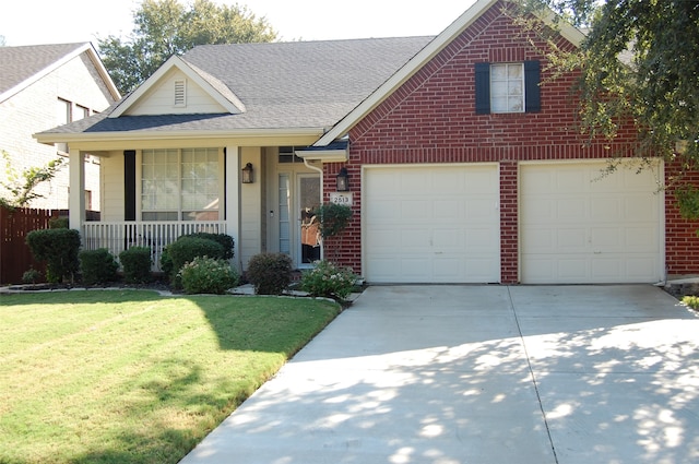 view of front facade featuring a garage and a front lawn