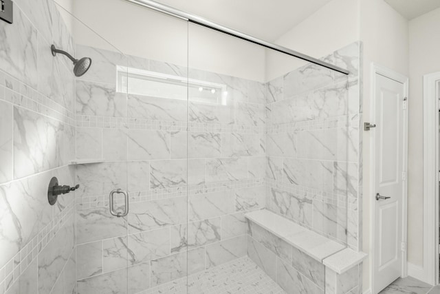 3909 Birch Grove Bnd, Denton, TX 76226 - bathroom with a stall shower and marble look tiles