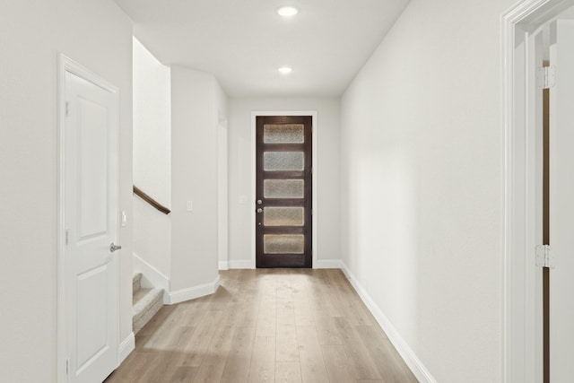 3909 Birch Grove Bnd, Denton, TX 76226 - doorway featuring light wood-type flooring, recessed lighting, stairs, and baseboards