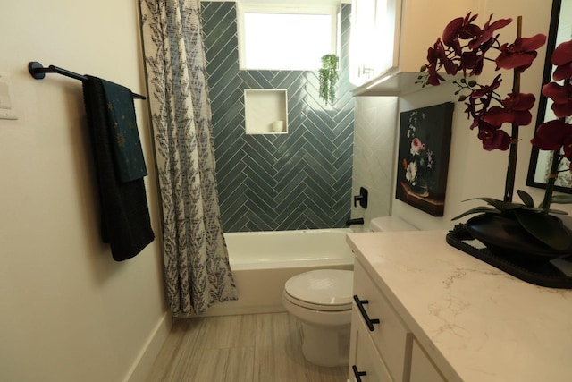 full bathroom with toilet, vanity, and shower / bath combo with shower curtain