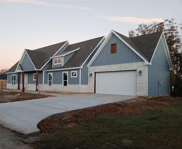 view of front of property featuring a garage