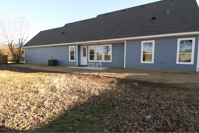 rear view of property featuring central AC and a patio