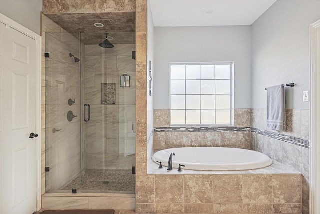 bathroom with independent shower and bath