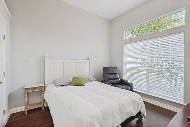 bedroom featuring dark hardwood / wood-style floors