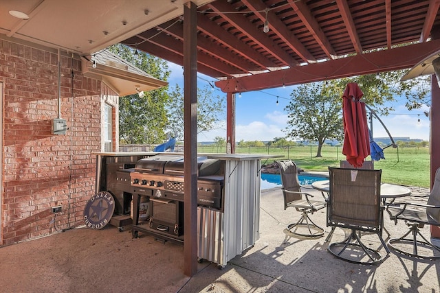 1252 Orchard Ln, Ennis, TX 75119 - view of patio / terrace with an outdoor pool and a grill