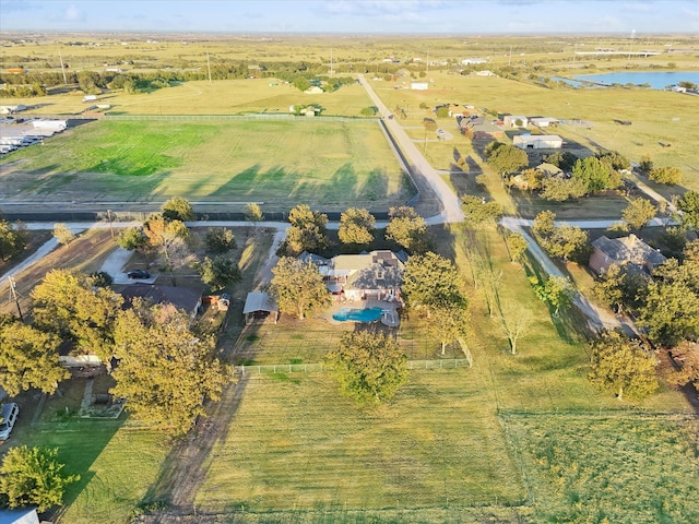 bird's eye view with a water view and a rural view