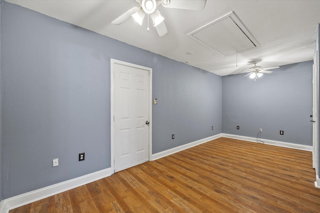 unfurnished room featuring ceiling fan and wood-type flooring