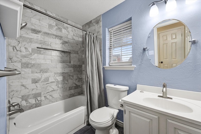 full bathroom with shower / tub combo with curtain, vanity, a textured ceiling, and toilet