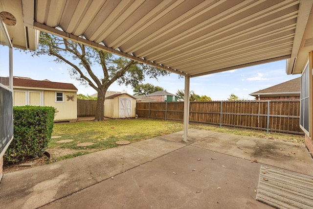 view of patio with a storage shed