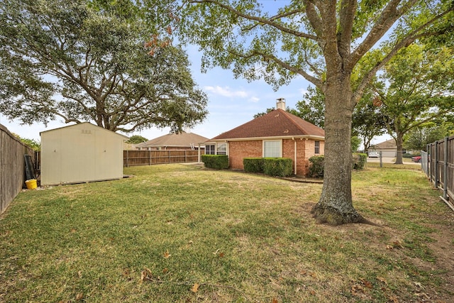 view of yard with a storage unit