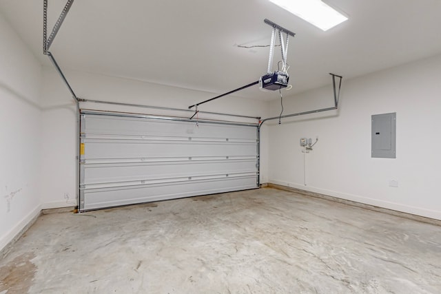 garage featuring electric panel and a garage door opener