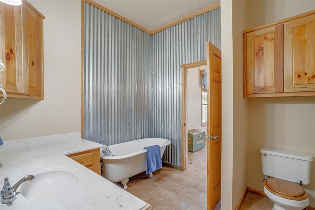 bathroom featuring a bathtub, toilet, and vanity