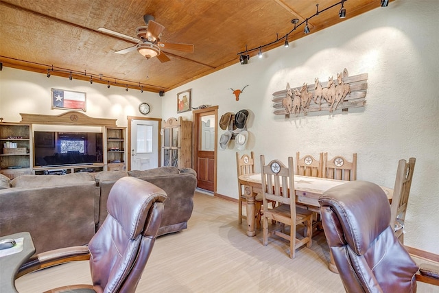 living room with rail lighting, ceiling fan, and wooden ceiling