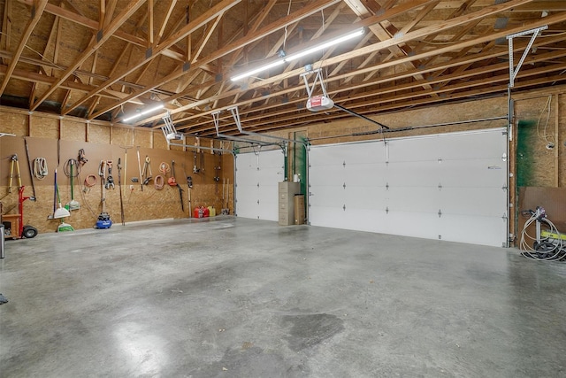 garage featuring a garage door opener