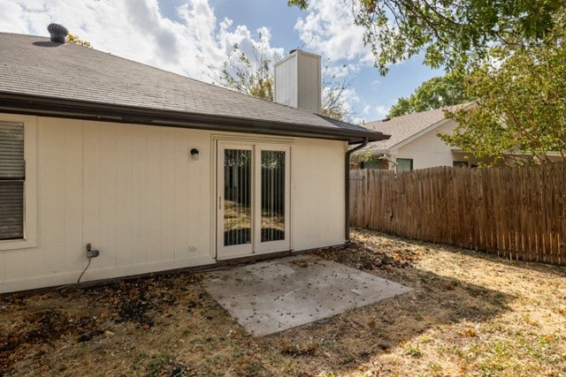 rear view of house with a patio