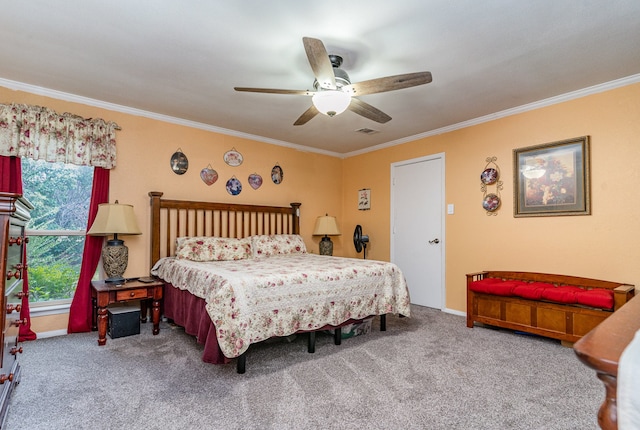 bedroom featuring carpet, ceiling fan, and crown molding