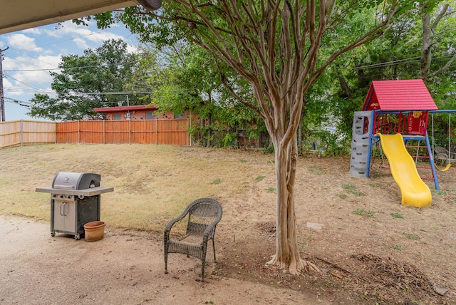 view of yard featuring a playground