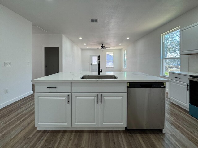 spare room featuring hardwood / wood-style floors and plenty of natural light