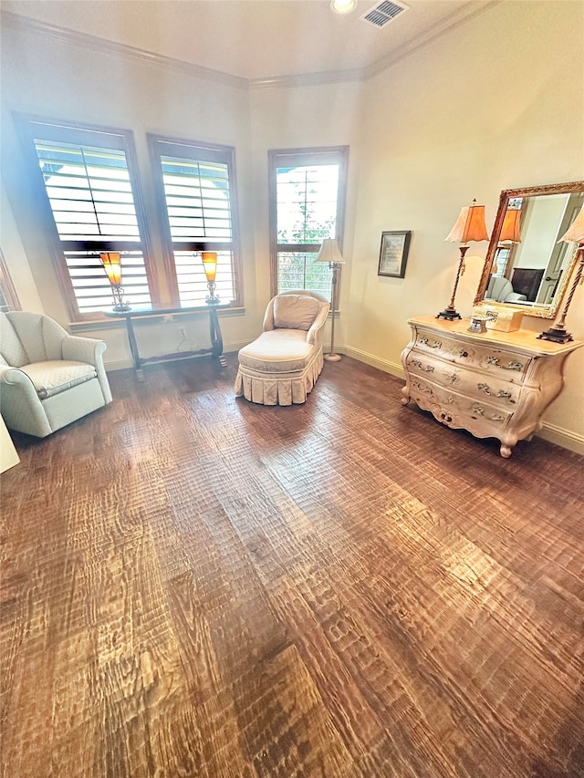 sitting room featuring ornamental molding