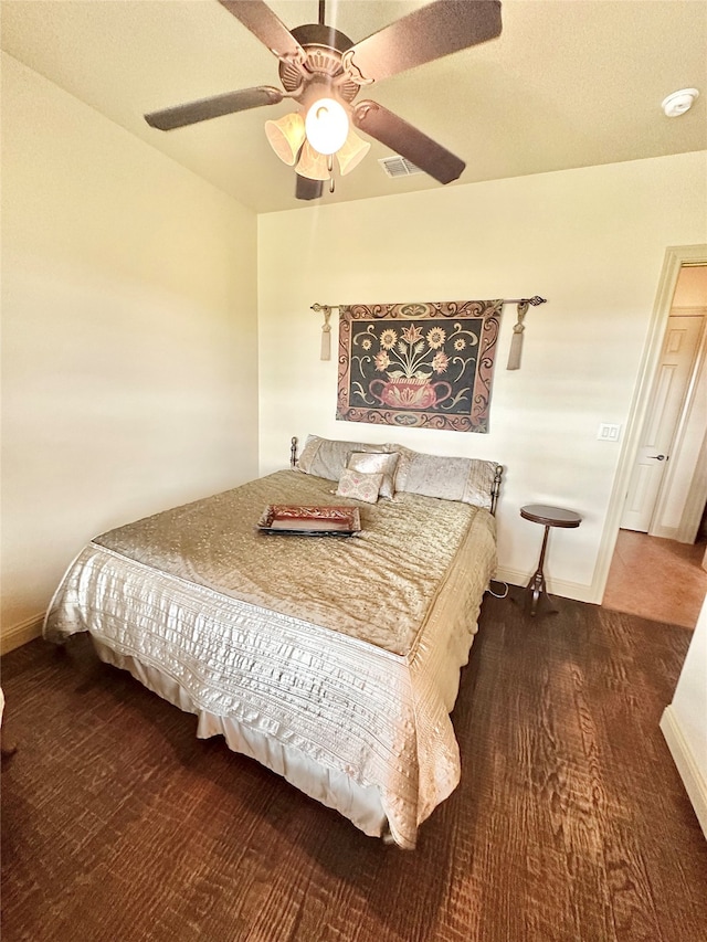 bedroom featuring ceiling fan and hardwood / wood-style flooring