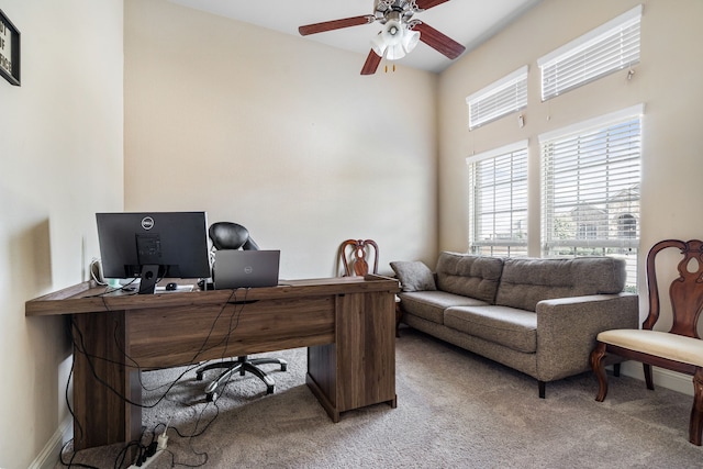 office space with ceiling fan and carpet floors