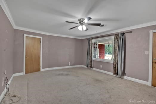 unfurnished living room with a healthy amount of sunlight and ceiling fan