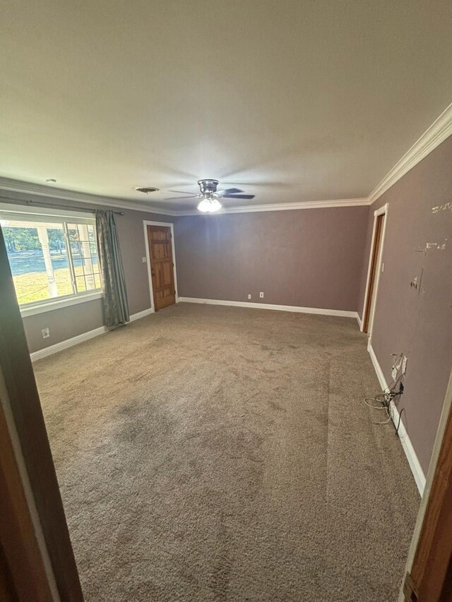 unfurnished living room featuring ceiling fan